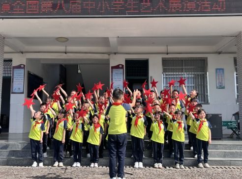 平江县栗山小学举行庆 六一 新队员入队仪式暨合唱比赛